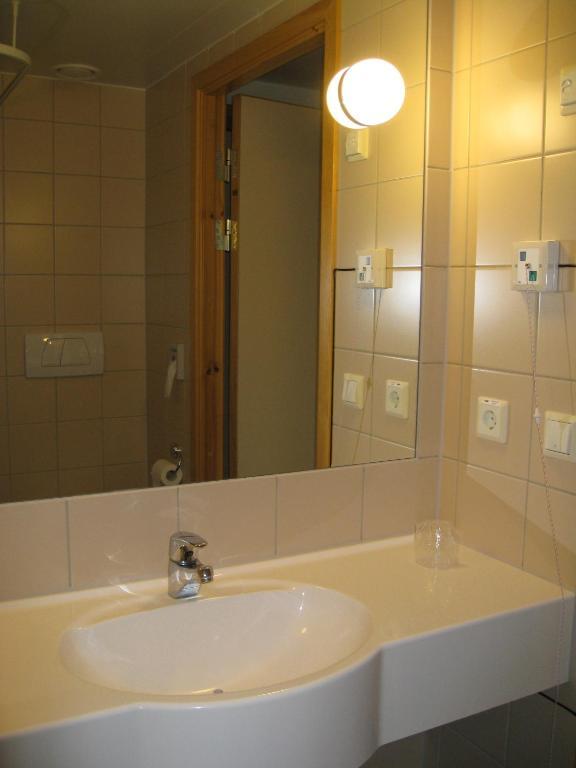 Unicare Roros Hotel Szoba fotó